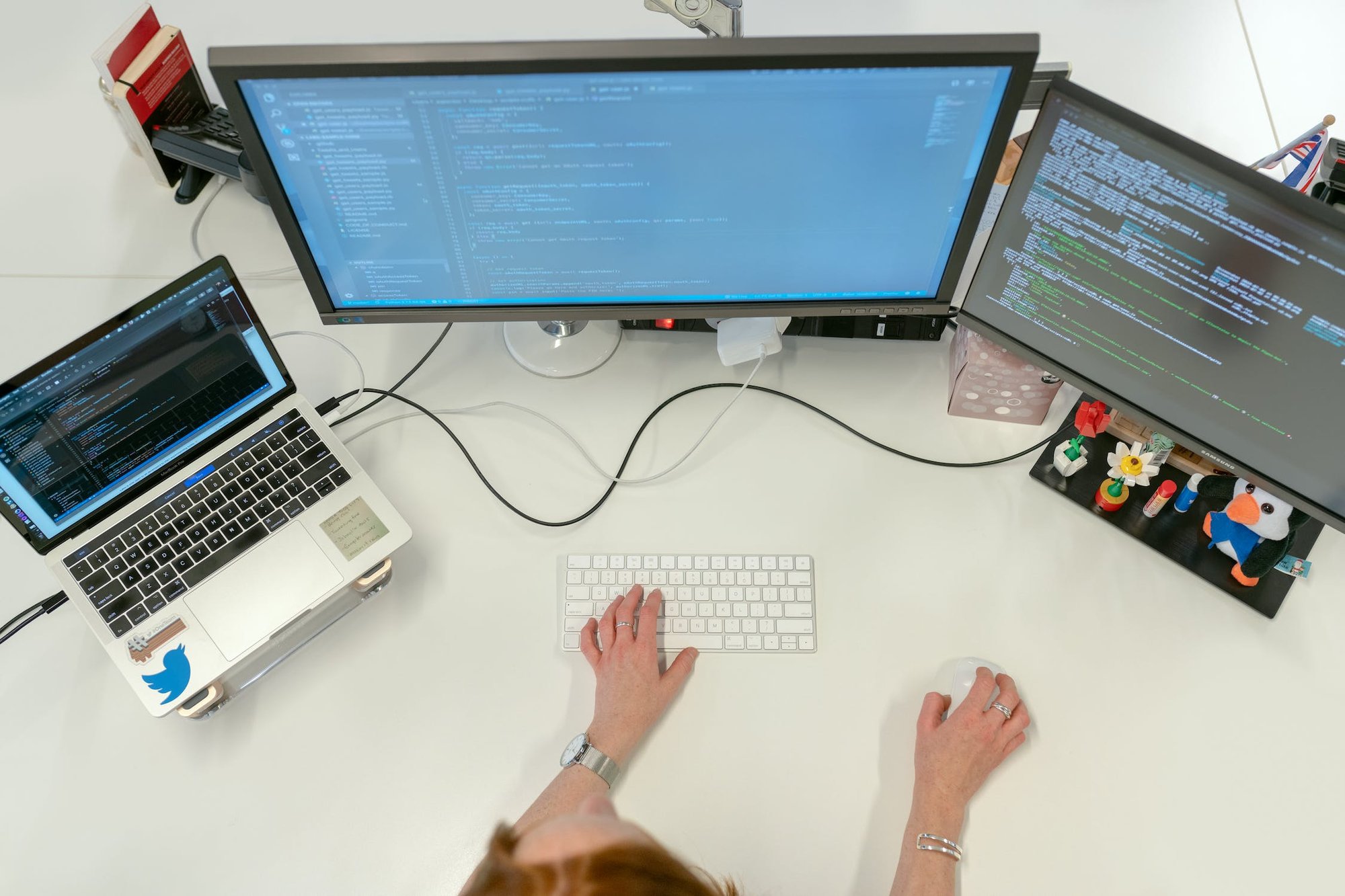 Person working on different computers